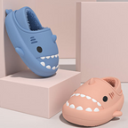 Cute shark-shaped slippers in blue with teeth design