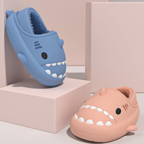 Cute shark-shaped slippers in blue with teeth design
